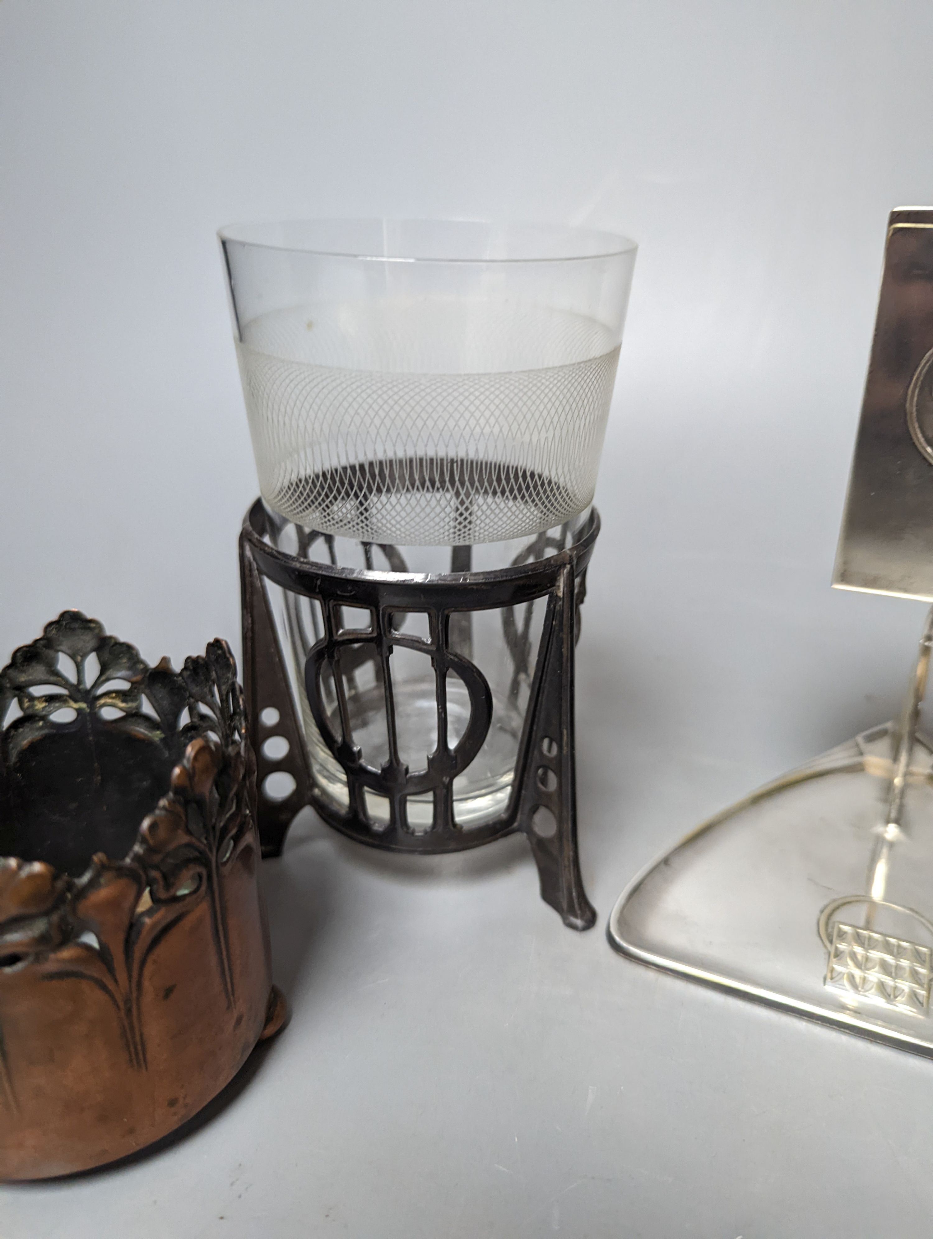 A pair of early WMF copper cup holders, pewter cup holder and a WMF matchbox holder